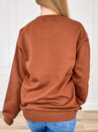 Brown crewneck sweatshirt back view with ribbed collar, cuffs, and hem