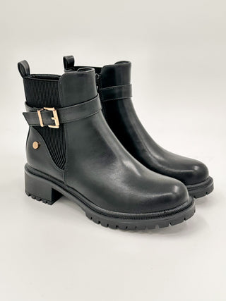 Black ankle booties with stacked heel, side elastic, buckle strap detail