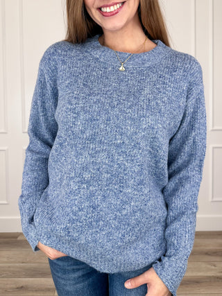 Blue knit long-sleeve sweater top with crew neck and ribbed cuffs
