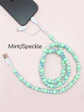 Mint speckled beaded phone charger cable with USB connector and coiled loop