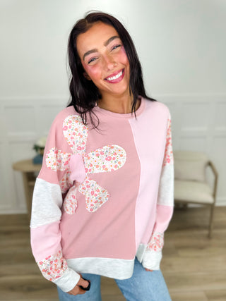 Long-sleeve cotton-blend top in dusty pink with floral four-petal graphic and gray hem
