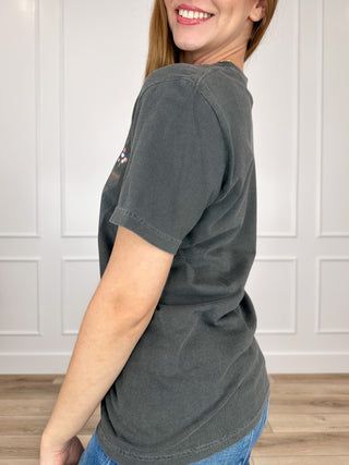 Grey short-sleeve cotton graphic tee, side view