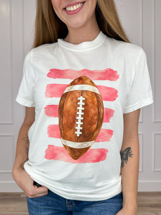 White cotton short-sleeve graphic tee with football on red watercolor splash