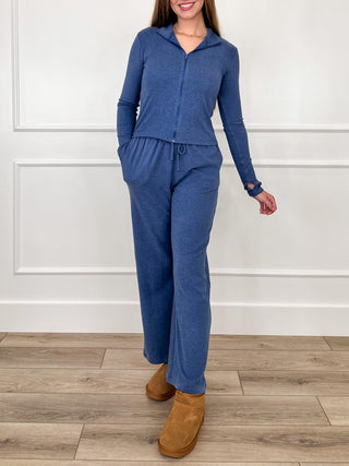 Blue high-rise lounge set with zip hoodie and drawstring wide-leg jogger pants