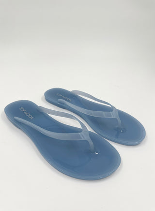 Light blue jelly thong sandals with glossy T-strap and open toe