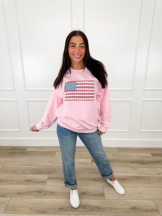 Pink lightweight crewneck sweatshirt with long sleeves and star-spangled striped front graphic