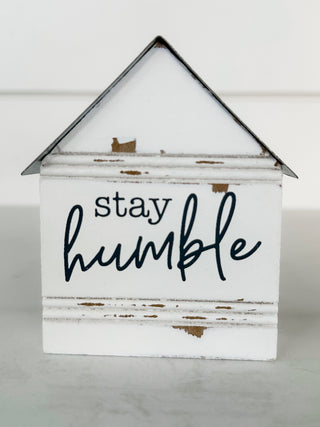 White wooden shelf sitter with roof and Stay Humble script