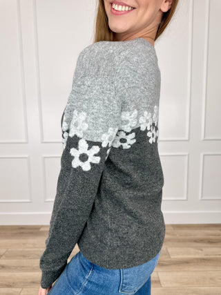 Grey knit long-sleeve sweater with white floral band and flower pattern