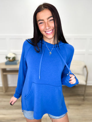 Lightweight blue long-sleeve hooded top with kangaroo pocket and drawstring ties