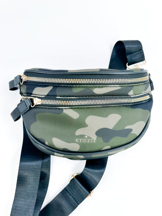 Green camo neoprene crossbody bag with adjustable strap and multiple zip compartments