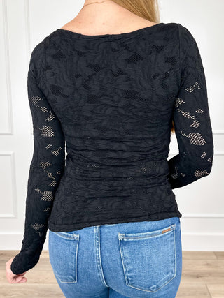 Black textured knit long sleeve top, scooped back