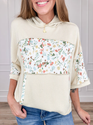 Cream ribbed hooded short sleeve top with floral chest panel and matching floral sleeves