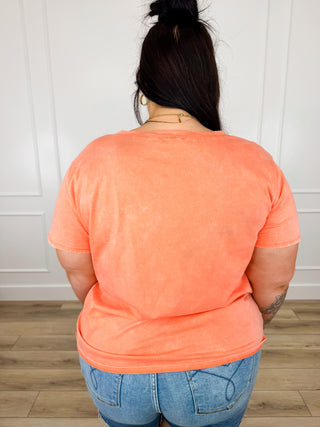 Orange cotton short-sleeve V-neck top, back view