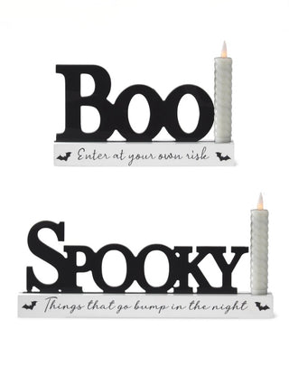 LED wood decor with Boo and Spooky cutouts and two lit candle candles