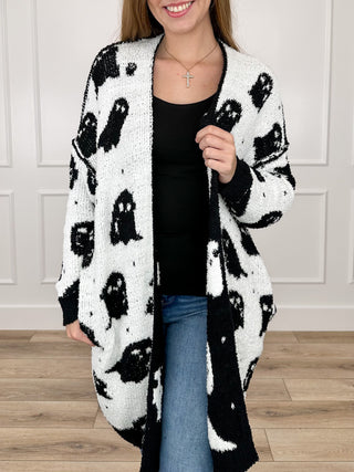 Reversible long-sleeve knit cardigan, white with black ghost print, open front