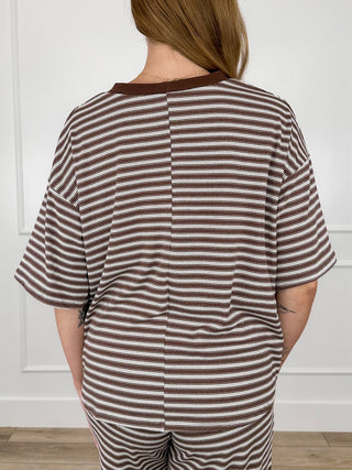 Brown and white striped short-sleeve top, back view with rounded crew neckline