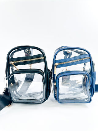 Clear crossbody bag with two zip compartments and adjustable strap, dark and blue