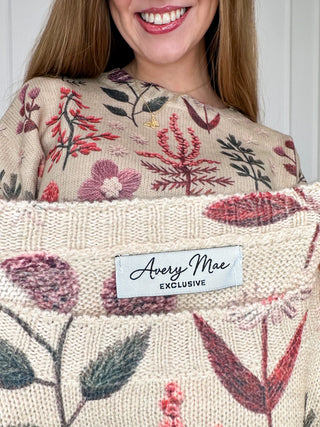 Oat knit sweater top with floral botanical print and Avery Mae exclusive brand patch