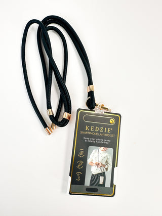 Black faux leather lanyard with gold clips and rectangular badge holder