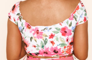 Floral off-shoulder swim top with underbust elastic band, pink and green flower print