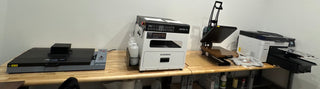 Custom t-shirt printing shop in Freeland MI with an Epson DTG printer, heat press and DTF curing station