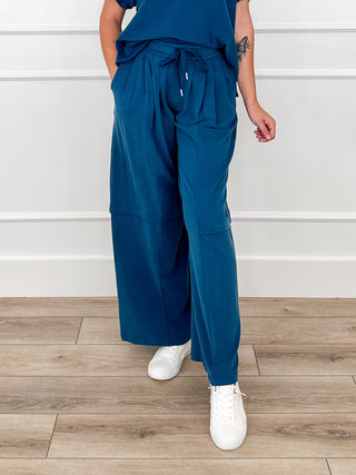 Crystal teal high-rise wide-leg pants with drawstring waist and cargo side pockets