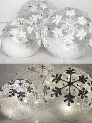 Light-up glass snowflake decor orbs in clear frosted finish, set of three