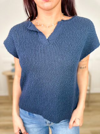 Navy blue short sleeve knit sweater top with V-neck