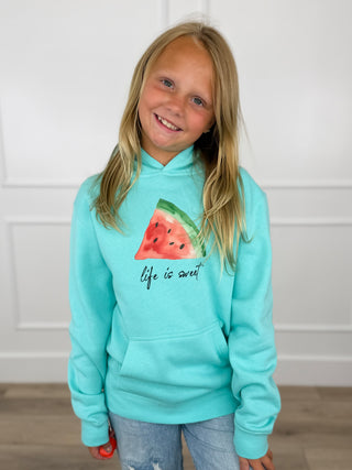 Kids turquoise hoodie worn with watermelon Life is sweet graphic, hood and kangaroo pocket