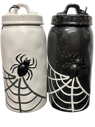 Ceramic canister set: white and black with black spider and web graphics, lidded