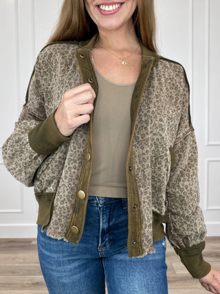 Olive green cotton button-up jacket with button front and patterned sleeves