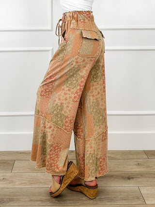 High-rise wide-leg pants with drawstring waist, patchwork floral print, side view
