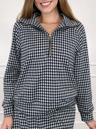 Black and white gingham quarter-zip long-sleeve knit top with half-zip collar detail
