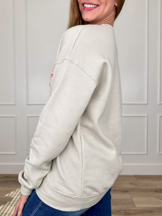 Oat crewneck sweatshirt with long sleeves, side view