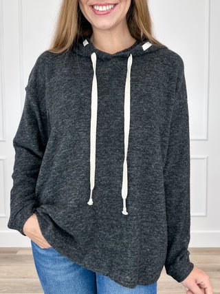 Black heather knit hooded long-sleeve top with two white drawstring cords.