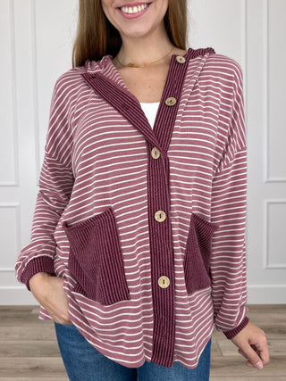 Pink striped hooded button-up long-sleeve top with front patch pockets