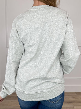 Grey crewneck sweatshirt with long sleeves and plain back