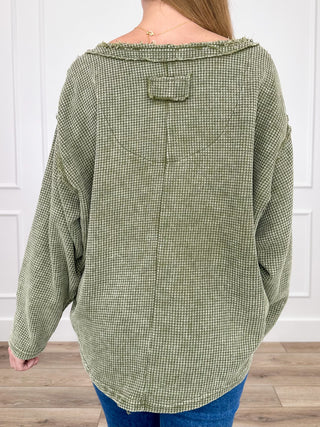 Green cotton-blend long-sleeve hooded top, back view with yoke and drawstring