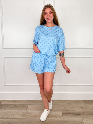 Light blue polka-dot knit lounge set, draped top and matching drawstring shorts