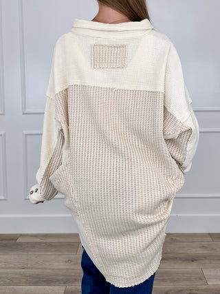 Cream hooded tunic top with textured knit back, relaxed fit, long sleeves