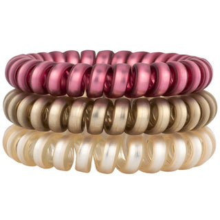 Rose and gold hair coil set with glossy mini coils, stacked in two rows.