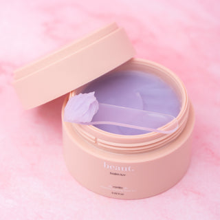 Vanilla balm luv beauty jar with open lid and pale purple balm
