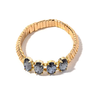 Gold-tone bead bracelet with four smoky gray round crystal charms in gold settings