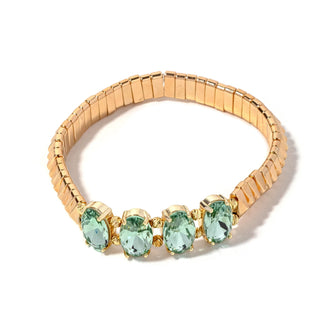 Gold-tone bead bracelet with four mint green oval crystal charms in gold settings