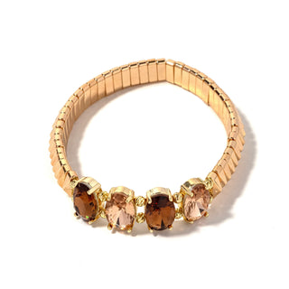 Gold-tone bead bracelet with four smoky brown oval crystal charms and gold settings