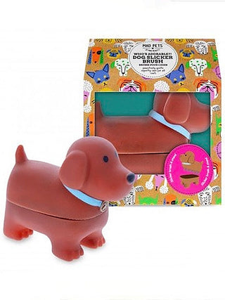 Dog slicker brush in blister packaging, red plastic dog with pink pin brush head