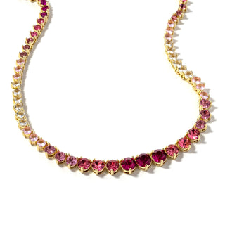 Pink gemstone tennis necklace with gold-tone prong-set stones