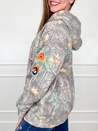 Camo print cotton-blend hoodie with long sleeves, hood, and kangaroo pocket; side view