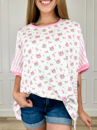 White cotton short-sleeve top with pink floral print and pink striped side sleeves