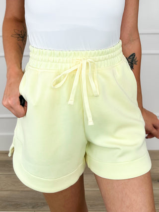 High-rise drawstring shorts, light yellow, elastic waistband and side pockets